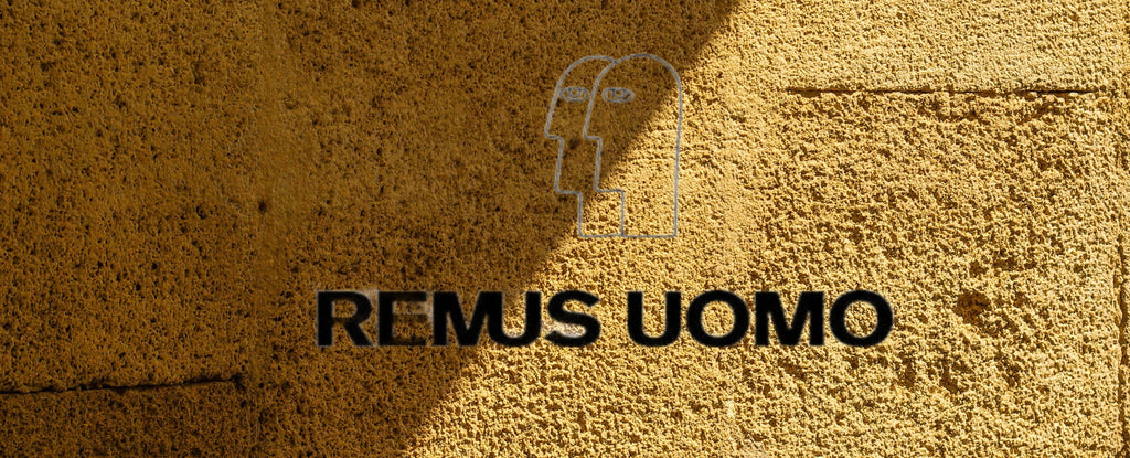 Remus Uomo Banner Blurred Background