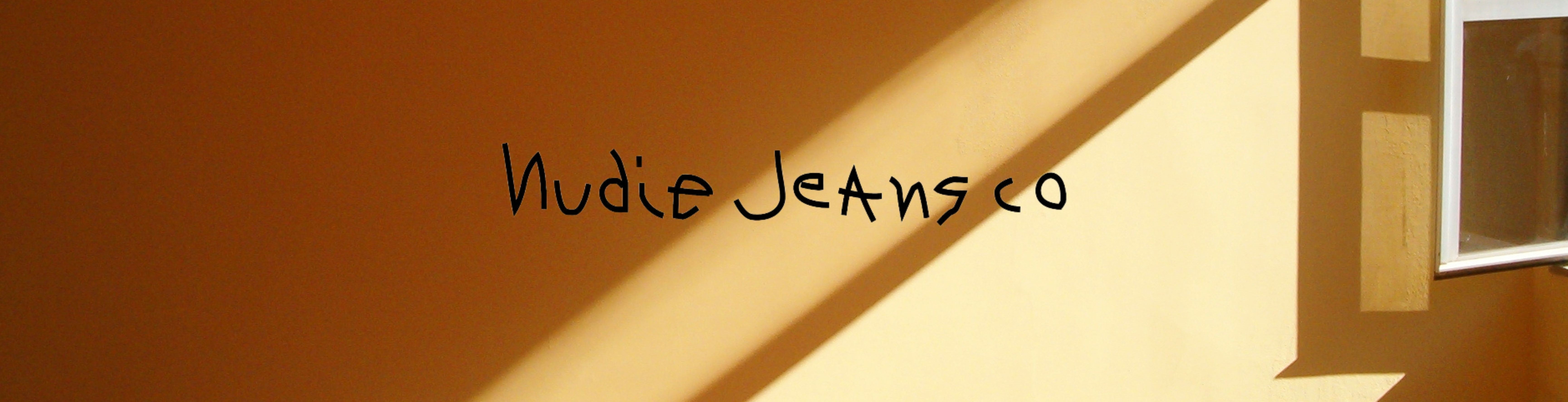Nudie Jeans Slider Blurred Background